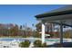 Community pool with chairs, tables, slide, and covered structure at 525 Morning Oaks Dr, Holly Springs, NC 27540