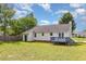 Backyard featuring grass and a wooden deck at 5317 Cottage Bluff Ln, Knightdale, NC 27545