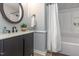 Bathroom featuring vanity with stone countertop and tub at 5317 Cottage Bluff Ln, Knightdale, NC 27545