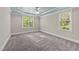Bright bedroom featuring a stylish ceiling fan and ample natural light at 5705 Tannibark Ln, Fuquay Varina, NC 27526
