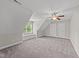 Finished bonus room bedroom with natural light at 5705 Tannibark Ln, Fuquay Varina, NC 27526