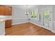 Charming dining area with natural light and access to the outdoor space at 5705 Tannibark Ln, Fuquay Varina, NC 27526