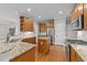 Spacious kitchen with granite countertops, stainless steel appliances, and a center island at 5705 Tannibark Ln, Fuquay Varina, NC 27526