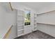 Spacious walk-in closet with shelving and rod space, designed for organized storage at 5705 Tannibark Ln, Fuquay Varina, NC 27526