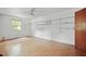 Bright bedroom featuring linoleum floors, a window and built in shelving at 5743 Craig Rd, Durham, NC 27712