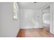 Bright bedroom featuring linoleum floors, a window and built in shelving at 5743 Craig Rd, Durham, NC 27712