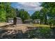 Expansive backyard with above-ground pool, shed, and plenty of space for outdoor activities at 6237 Nc 96 Hwy W, Youngsville, NC 27596