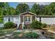 Charming single-story home with a covered front porch and well-maintained landscaping at 6237 Nc 96 Hwy W, Youngsville, NC 27596