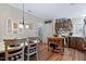 Kitchen with custom cabinets and a view into the dining area at 6237 Nc 96 Hwy W, Youngsville, NC 27596
