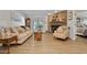 Inviting living room with hardwood floors and a stone fireplace at 6237 Nc 96 Hwy W, Youngsville, NC 27596