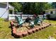 Inviting outdoor patio with cozy seating area, perfect for relaxing and enjoying the outdoors at 6237 Nc 96 Hwy W, Youngsville, NC 27596