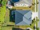 Overhead view of the property highlighting the roof, well-maintained lawn, and outdoor patio area at 636 Copper Beech Ln, Wake Forest, NC 27587