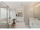 Spacious bathroom features a separate shower and soaking tub, double sinks, and white cabinets at 636 Copper Beech Ln, Wake Forest, NC 27587