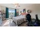 Bedroom with ceiling fan, window, and carpet at 636 Copper Beech Ln, Wake Forest, NC 27587