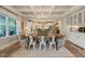 Elegant dining room with a wooden table, chandelier, and open access to the kitchen at 636 Copper Beech Ln, Wake Forest, NC 27587