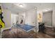 Large game room with ping pong table and access to the living room at 636 Copper Beech Ln, Wake Forest, NC 27587