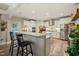 Bright kitchen with stainless steel appliances and a breakfast bar at 636 Copper Beech Ln, Wake Forest, NC 27587