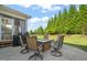Concrete patio featuring comfortable seating and a built-in gas grill, perfect for outdoor entertaining at 636 Copper Beech Ln, Wake Forest, NC 27587