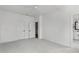 An empty bedroom with two doors and ceiling fan at 6416 Tanner Oak Ln, Raleigh, NC 27613
