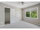 Bedroom featuring a closet, window with blinds, and neutral walls at 7019 Bellard Ct, Raleigh, NC 27617