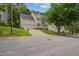 Charming two-story home with a two-car garage, landscaped lawn, and a traditional design at 7019 Bellard Ct, Raleigh, NC 27617
