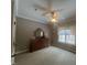 Bedroom has an overhead fan and a dresser with a mirror at 7212 Donneeford Rd, Wake Forest, NC 27587
