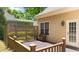 Cozy outdoor deck with wood railings, lattice, and a seating area at 7212 Donneeford Rd, Wake Forest, NC 27587