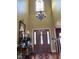 Elegant foyer featuring hardwood floors, stained glass window, and staircase at 7212 Donneeford Rd, Wake Forest, NC 27587