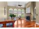 Open living room featuring a fireplace, hardwood floors and lots of natural light at 7212 Donneeford Rd, Wake Forest, NC 27587