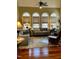 Comfortable living room featuring hardwood floors, ambient lighting and lots of natural light at 7212 Donneeford Rd, Wake Forest, NC 27587