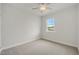 Neutral bedroom with carpeted floor, ceiling fan and single window at 73 Windswept Way, Fuquay Varina, NC 27526