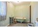 A vintage bathroom featuring a clawfoot tub, a vanity with toiletry storage, and natural light at 82 Deercorn Path, Moncure, NC 27559