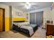 A vibrant bedroom with a blue daybed, creating a playful and inviting atmosphere for rest and relaxation at 82 Deercorn Path, Moncure, NC 27559