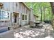 Charming porch with outdoor seating, dining, and hot tub at 82 Deercorn Path, Moncure, NC 27559