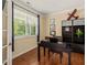 Cozy home office with natural light, hardwood floors, and elegant decor at 901 Lemongrass Ln, Wake Forest, NC 27587