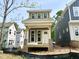 New construction home with white trim and light brown siding at 901 Linwood Ave, Durham, NC 27701
