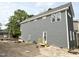 Two-story home featuring gray siding, white trim, and modern windows at 903 Linwood Ave, Durham, NC 27701