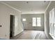 Unfinished living room with trim ready for paint, offering a blank canvas for customization at 903 Linwood Ave, Durham, NC 27701