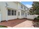 Spacious backyard featuring a brick patio and lush landscaping at 9117 Meadow Mist Ct, Raleigh, NC 27617