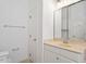 Bright bathroom featuring a vanity with ample storage and counter space at 9117 Meadow Mist Ct, Raleigh, NC 27617