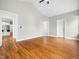 Spacious bedroom with vaulted ceiling, hardwood floors, and ensuite bathroom access at 915 Edgewater Cir, Chapel Hill, NC 27516