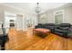 Open-concept home featuring hardwood floors connecting the living room, dining room, and kitchen at 915 Edgewater Cir, Chapel Hill, NC 27516