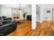 Modern living room boasts a cozy fireplace and gleaming hardwood floors at 915 Edgewater Cir, Chapel Hill, NC 27516