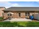 Charming brick home featuring a patio with outdoor seating, perfect for enjoying the backyard at 928 Arrowhead Ln, Mebane, NC 27302