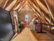 Spacious attic with exposed beams and natural light at 948 Uprock Dr, Cary, NC 27519