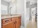Bathroom featuring granite countertops, wooden cabinets, tile floors, and shower/tub combo at 948 Uprock Dr, Cary, NC 27519