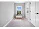Cozy bedroom with large window and soft neutral carpeting at 948 Uprock Dr, Cary, NC 27519