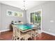 Cozy dining room featuring stylish table and chairs, with a view of the outdoors at 948 Uprock Dr, Cary, NC 27519