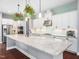 Modern kitchen with stainless steel appliances and a large center island at 948 Uprock Dr, Cary, NC 27519