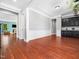 Spacious living room with hardwood floors and ample natural light at 948 Uprock Dr, Cary, NC 27519